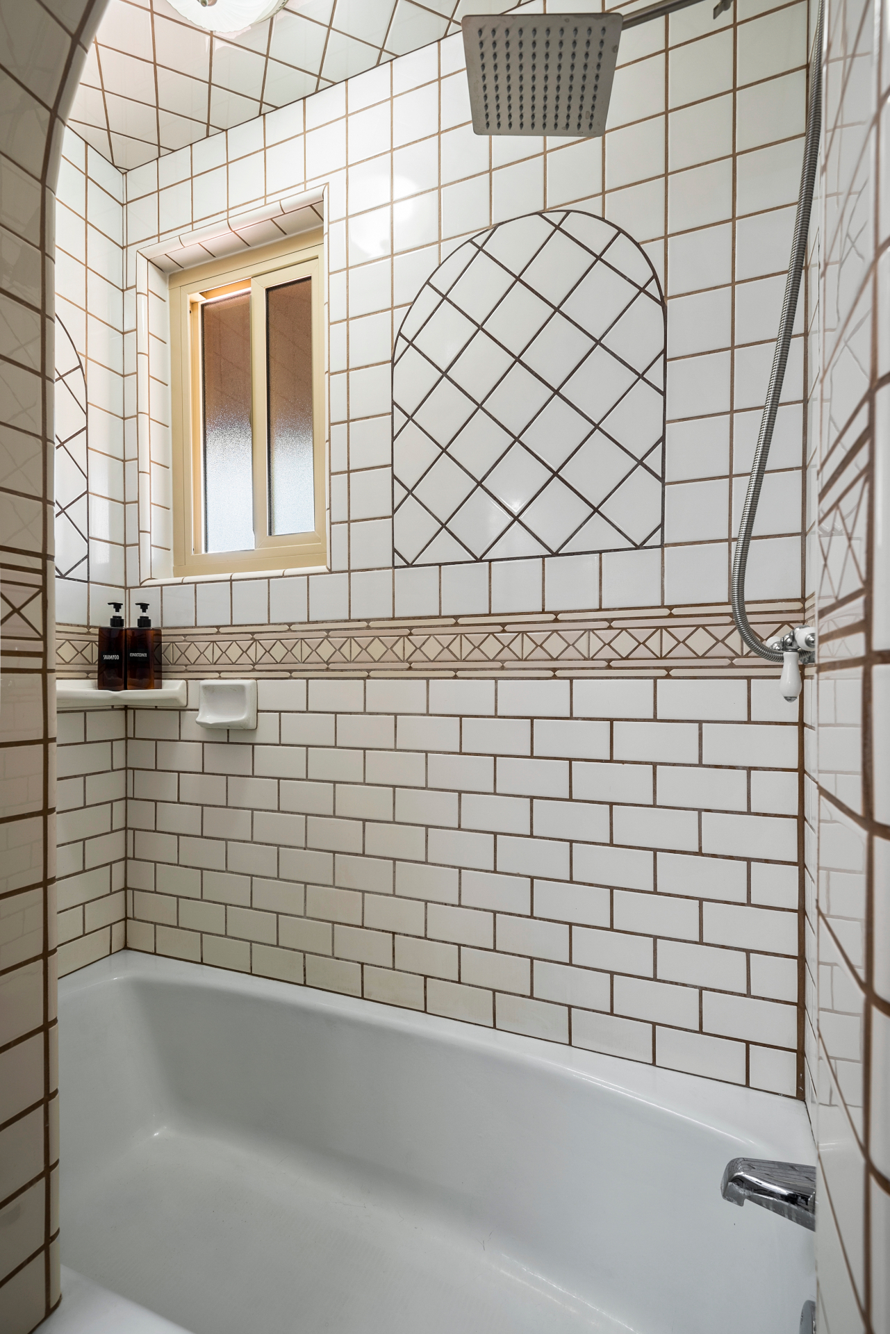 Bathroom 1 (shared) — shower and tile detail